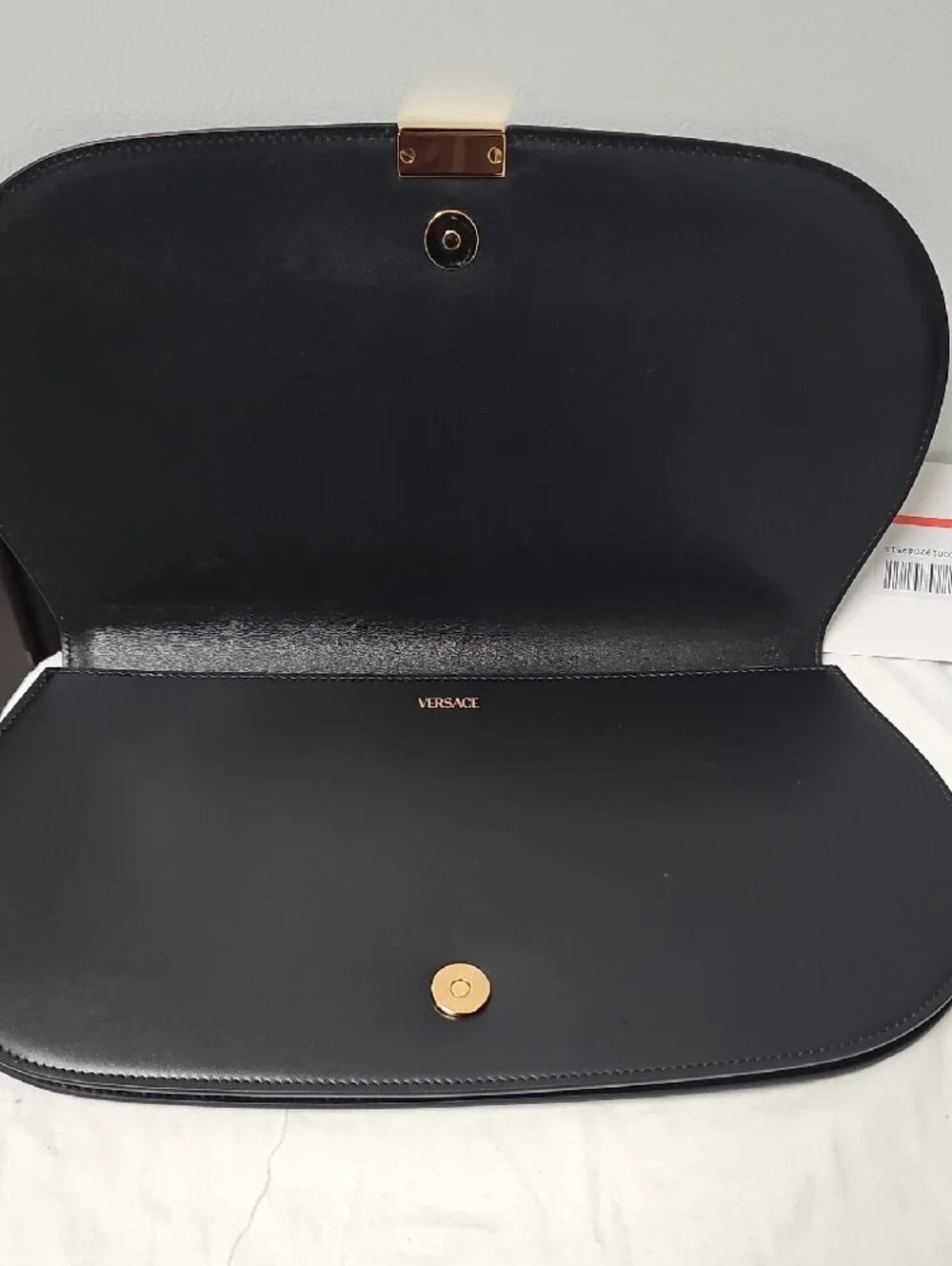 Versace Black Leather Clutch with Gold Greek Key Accent